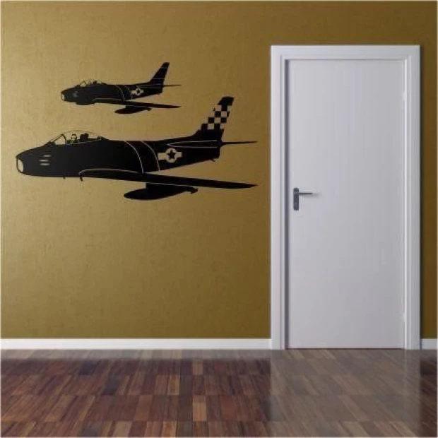 Airplane sticker 01 in a stylish arrangement on a brown wall, perfect for a young pilot\'s room.