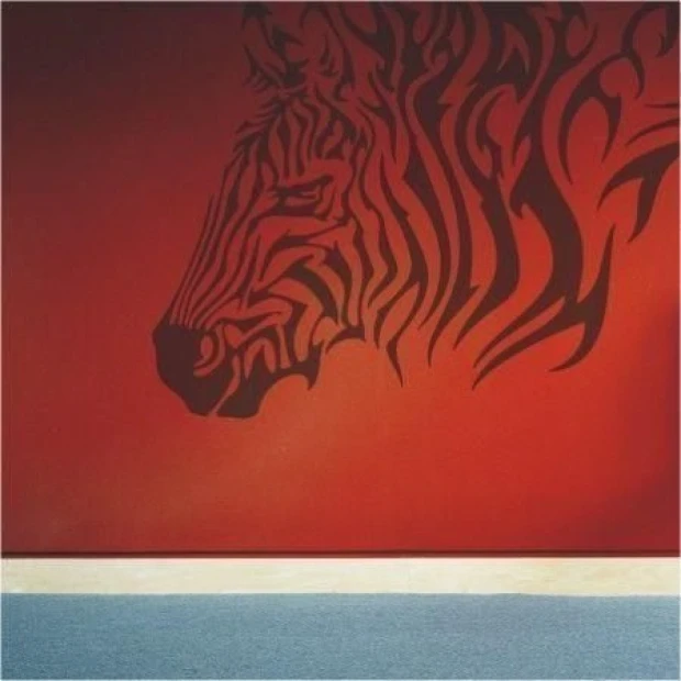 Stylish zebra sticker 01 in a modern interior, perfect for bold wall designs in red.
