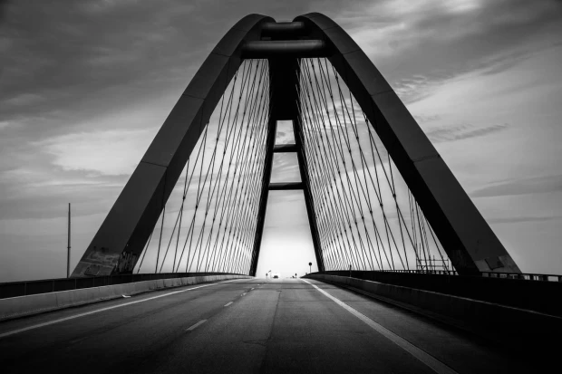 Wall mural of an empty sunset bridge FP 3530 - Graphic design. Arch-shaped bridge.
