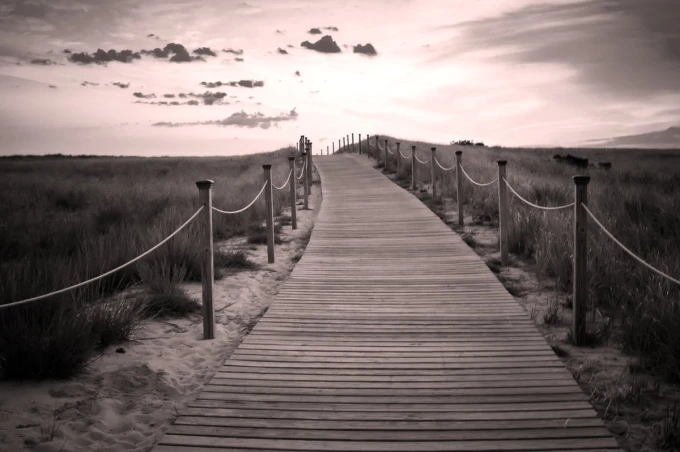 Wall mural of a long wooden pier leading to the beach FP 3594 - Graphic design featuring a sandy path.