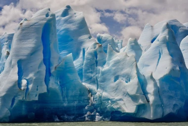 Ice rock wall mural FP 3771 - Graphic design featuring blue and white formations resembling icebergs.