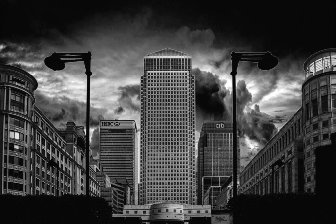 Wall mural of swirling clouds over London FP 3782 - Office decor with dark walls and modern furniture.