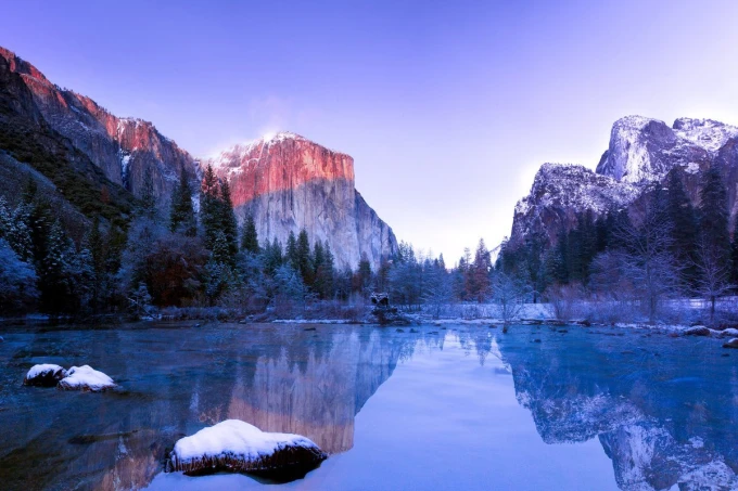 Pastel mountain wall mural FP 4319 - Graphic design. Mountains in shades of purple and orange, with reflection.