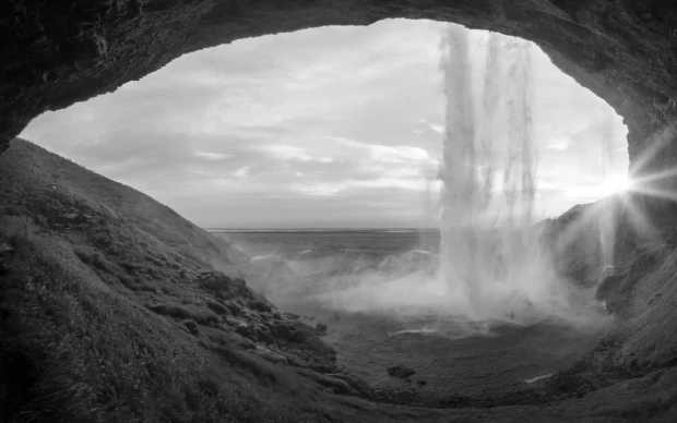 Wall mural of a turbulent waterfall FP 4432 - Graphic design with water cascading, creating mist and light reflections.