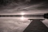Wall mural of a lakeside pier at sunset FP 4519 - Graphic design. The pier leads towards the horizon.