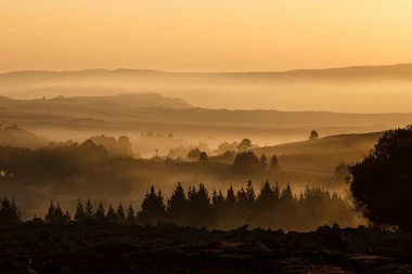 Autumn hills wallpaper at sunset FP 4537 - Graphic design featuring hills, trees, and mist.