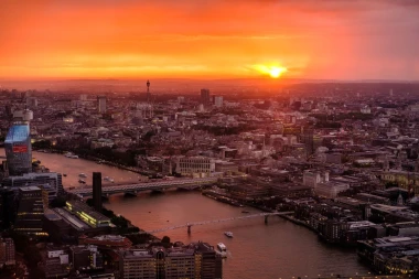 Sunset wall mural of London skyline FP 4626 - Graphic design with orange and red hues in the sky.