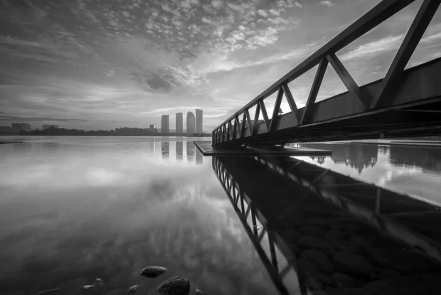 Wall mural of a bridge reflected in calm water FP 4896 - Graphic design. Metal truss bridge reflection.