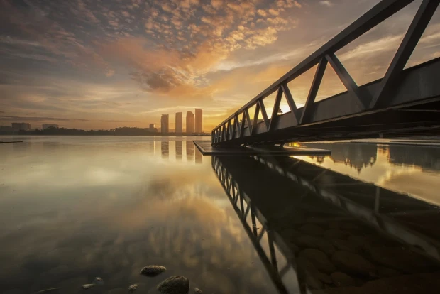 Wall mural of a bridge reflected in calm water FP 4896 - Graphic design. Metal structure bridge with reflection.