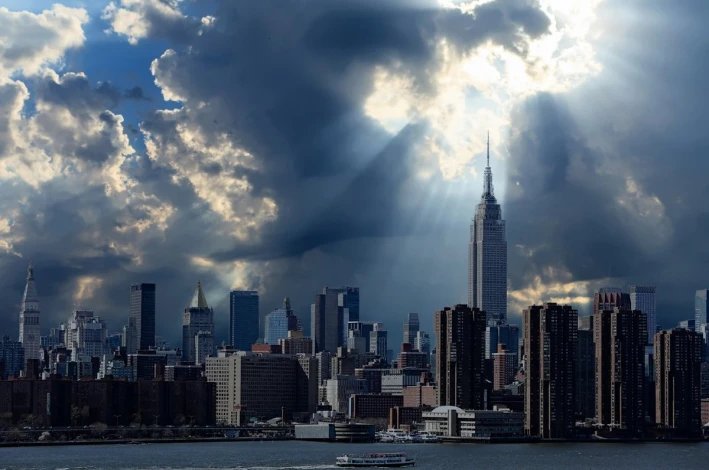 Wall mural of sun rays shining on a city skyline FP 4931 - Graphic design featuring tall buildings.