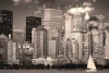 Wall mural illuminated New York FP 4943 - Graphic design. View of the city skyline with skyscrapers and a sailboat.