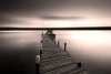 Wall mural of a black and white lake bridge design FP 5198. A wooden bridge leads to a boat.
