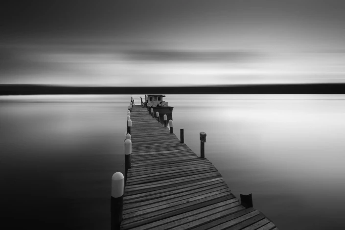 Black and white wall mural of a wooden bridge over a lake, graphic design FP 5198.