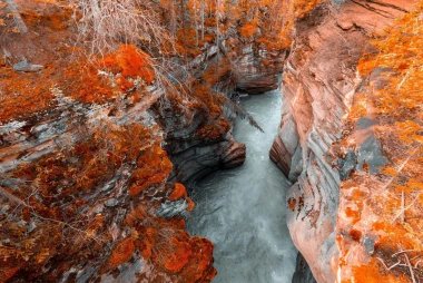 Wall mural of a stream in a canyon FP 5425 - Graphic design. Stream in a narrow canyon surrounded by rocks.