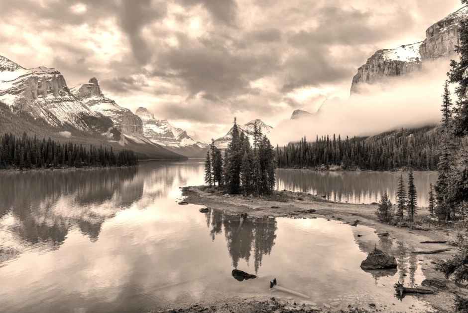 Wall mural of a lake peninsula in the mountains FP 5458 - Graphic design featuring a lake surrounded by mountains and forest.