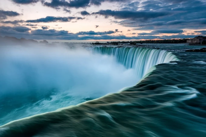 Wall mural of an extraordinary waterfall FP 5455 - Graphic design with cascading water creating mist and ripples.