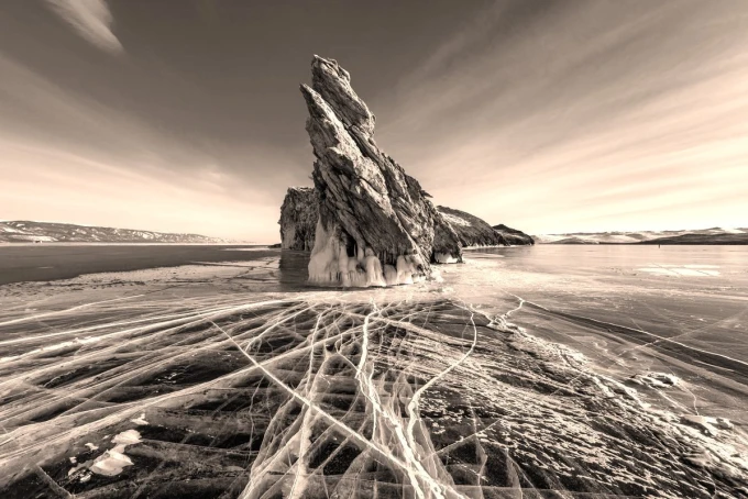 Wall mural cracked ice FP 5457 - Graphic design with transparent lines on ice and a large rocky formation.