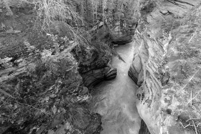 Wall mural of a canyon stream FP 5425 - Graphic design featuring a narrow canyon with water and rocks.