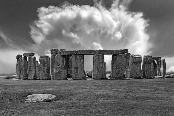 Wall mural Stonehenge FP 5555 - Graphic design featuring stone structures in circles against a cloudy background.