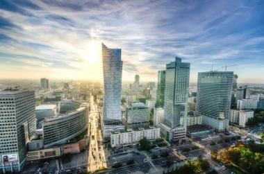 Wall mural of modern skyscrapers in Warsaw FP 5895 - Office decor with gray walls and minimalist furniture.