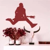 Rock musician painting template 2254 - Decor in the living room. Jumping musician with a guitar on the wall.