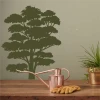 Tree painting stencil 2369 - Kitchen arrangement with green walls and wooden furniture.