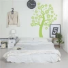 Tree painting template 2380 - Bedroom arrangement with light-colored walls and minimalist furniture.