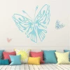 Butterfly painting template 2362 - Living room decor. Light walls with colorful cushions on the sofa.