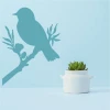 Bird on branch painting template 2372 - Graphic design featuring a bird on a branch with leaves and flowers.