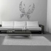 Butterfly wall template 2356 - Living room decor. Gray walls, light sofa, dark table.