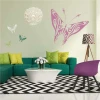 Flaming butterfly wall template 2361 - Living room decor with light walls and vibrant furniture.