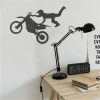 Motocross jumps wall art 2317 - Room decor with light walls and wooden furniture.