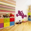 Go-kart painting template 2324 - Kids\' room decor with walls in horizontal stripes of various colors.