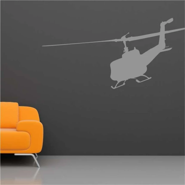 Military helicopter painting template 2304 - Room setup with gray walls and an orange sofa.