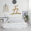Japanese painting template symbol five 2154 - Bedroom arrangement with light walls and minimalist furniture.