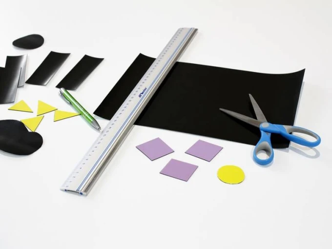 Self-adhesive steel foil A4 sheet - Graphic pattern with visible shapes of rectangles, triangles, and circles in various colors.