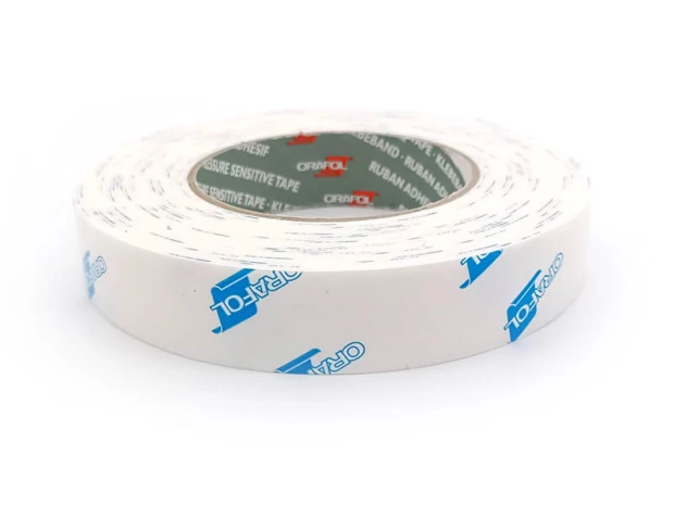 Oracal foam mounting tape 10 mm - Graphic design. White tape with blue logo and text on the surface.