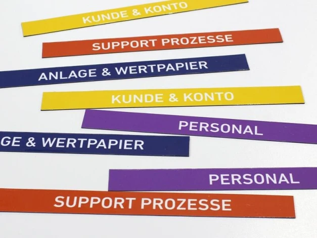 Custom printed magnet - Graphic design. Simple rectangular stripes in various colors with text.