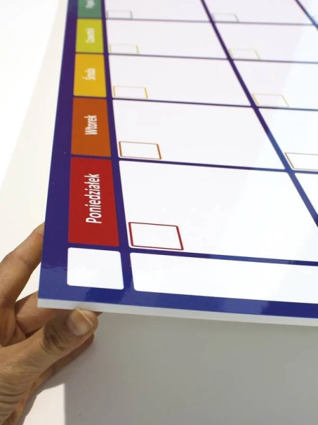Weekly dry-erase planner board 269 - Graphic design. Simple grid with colorful headers for the days of the week.