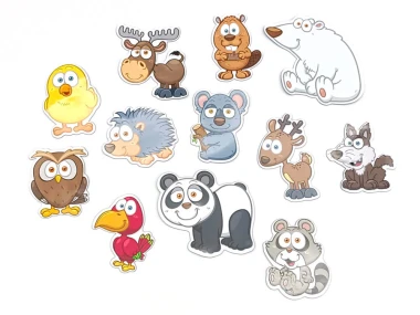 Forest animal magnets - Graphic design featuring animal shapes in brown, gray, white, and green colors.