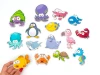 Sea animal magnets - Graphic design featuring colorful shapes of fish, crabs, and octopuses.