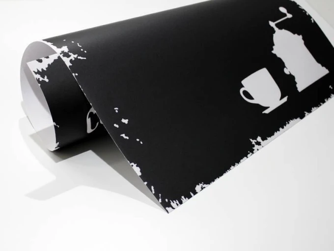 Chalkboard with coffee and tea print 020 - Black background with white silhouettes of a cup and coffee grinder.