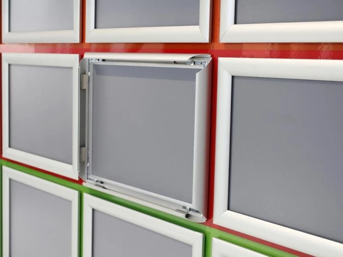 OWZ Frame - Office setup. Walls in red and green, frames in white.