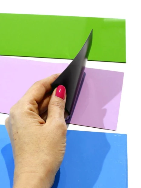 Magnetic dry-erase fridge magnet - Graphic design with simple rectangles in green, pink, and blue colors.