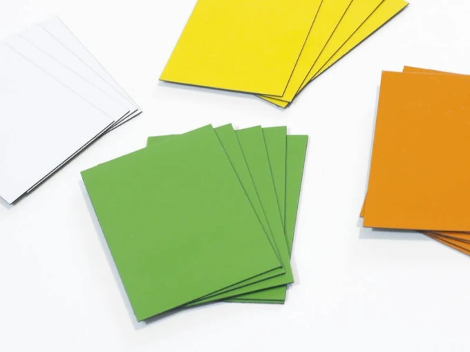 Magnetic dry-erase fridge magnet - Graphic design with simple rectangles in green, yellow, white, and orange.