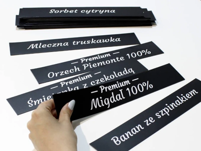 Chalkboard magnet with custom print - Black rectangle with white text, various messages available.