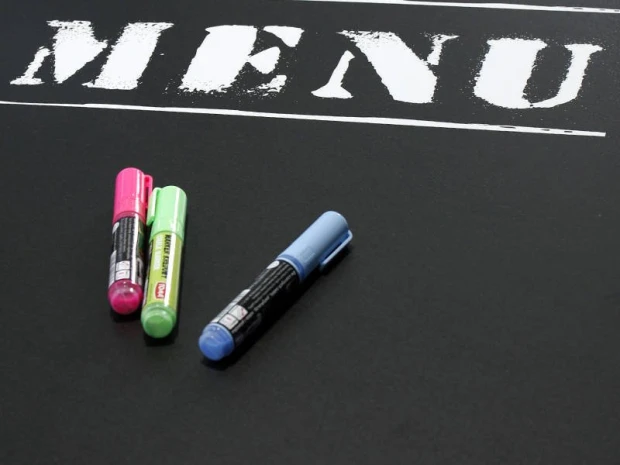 Chalkboard menu board 008 - Features a black background with white "MENU" text and three markers.
