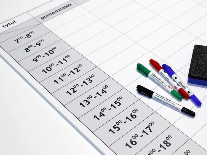 Stylish dry-erase board with a weekly planner, perfect for an office or creative space, in a minimalist design.