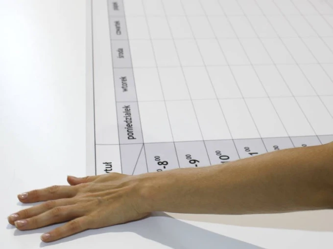 Weekly planner whiteboard in minimalist style, perfect for organizing tasks.