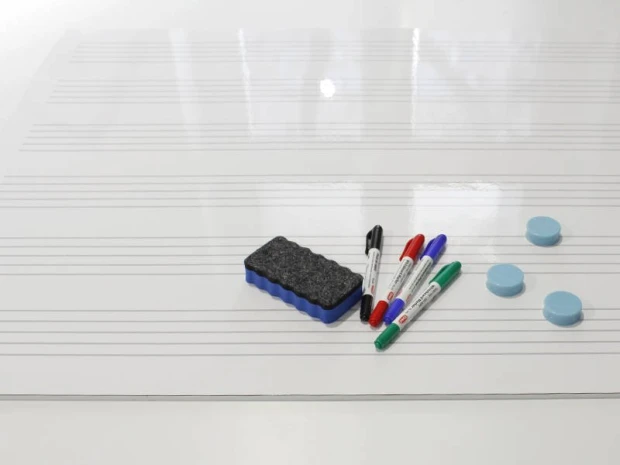 Magnetic whiteboard staff notation 001 - Graphic design with staff lines on a white background.
